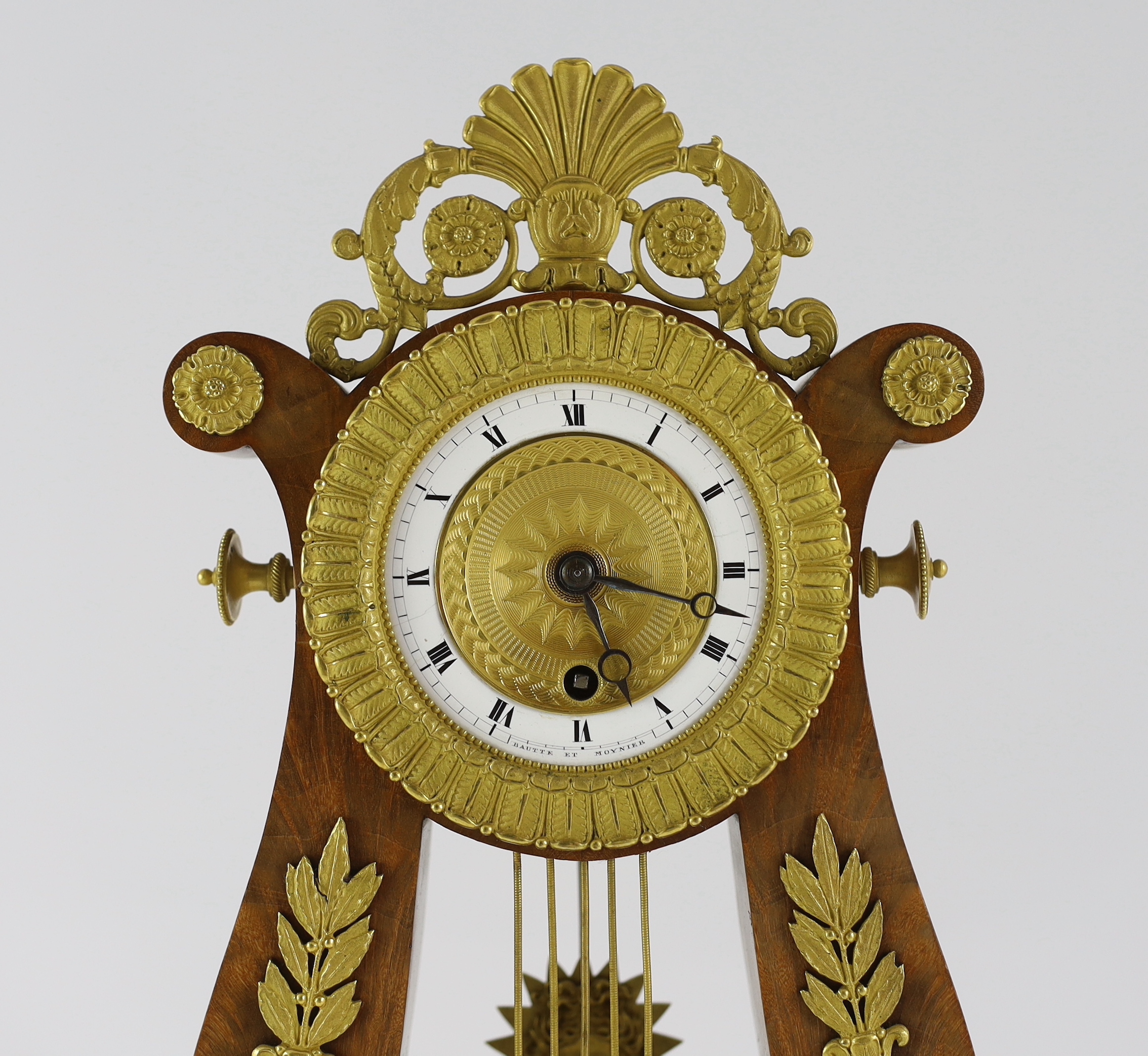 Bautte et Moynier, an early 19th century Swiss ormolu mounted mahogany lyre shaped mantel timepiece